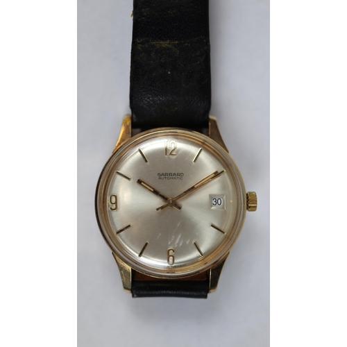 108 - Gents gold Garrard watch in working order