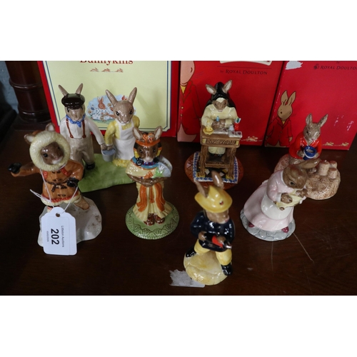 202 - 7 Bunnykins figurines in original boxes by Royal Doulton