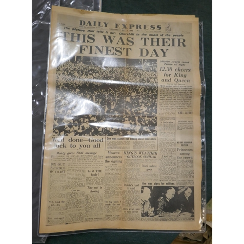 214 - Collection of old newspapers with important wartime headlines