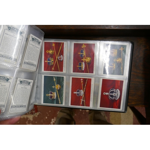 229 - 2 albums of cigarette cards