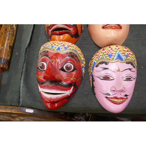 261 - 6 Indonesian hand painted face masks