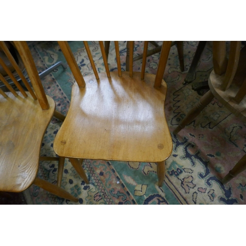 497 - Pair of blonde elm Ercol chairs