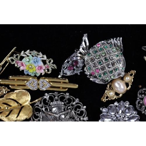 88 - Collection of brooches to include silver