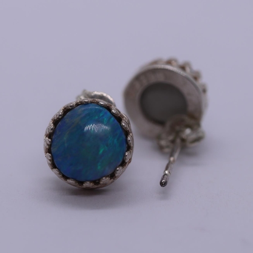 105 - Pair of silver earrings set with blue opal