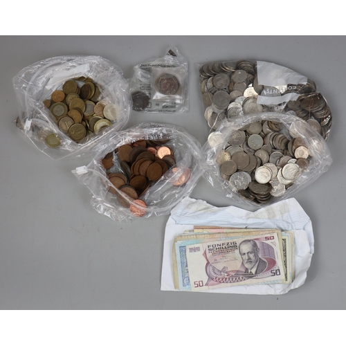 143 - Collection of foreign currency to include silver, brass, copper and notes