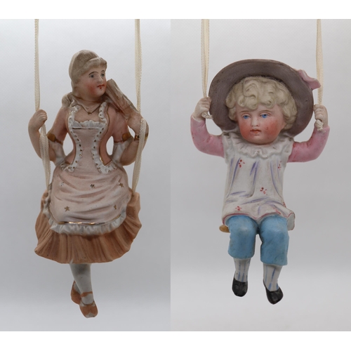 183 - 2 ceramic figures on swings - possibly German