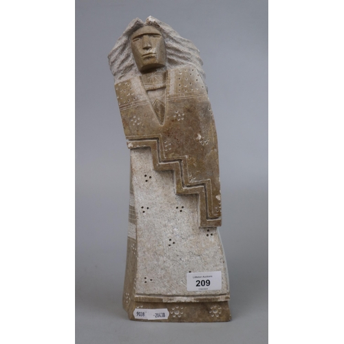 209 - Interesting Native American stone sculpture decorated and signed to reverse - Approx height: 33cm