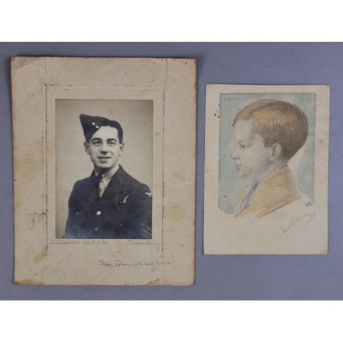 243 - Photograph of an airman together with a watercolour of child (possibly the airman when younger)