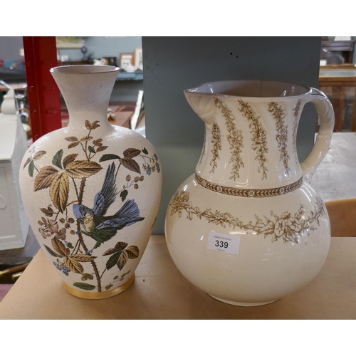 339 - Large jug together with a vase