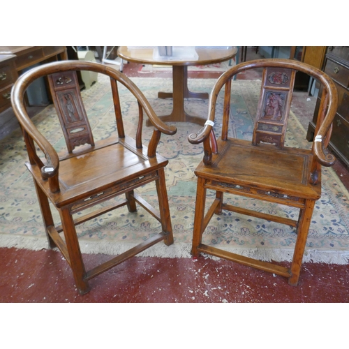 410 - Pair of interesting Chinese horse shoe chairs