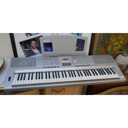 526 - Yamaha Portable Grand keyboard model DGX-205