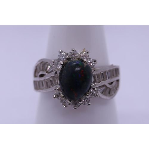 108 - Silver ring set with Ethiopian opal and CZ