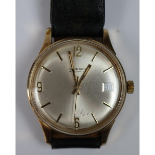 175 - Gents gold Garrard watch in working order