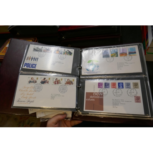 306 - 5 Stanley Gibbons Stamps of the World catalogues together with a collection of 1st day covers