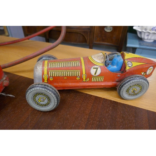 374 - Collection of tin plate toys to include Triang together with a rocking horse