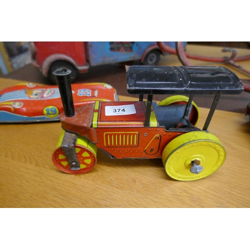 374 - Collection of tin plate toys to include Triang together with a rocking horse