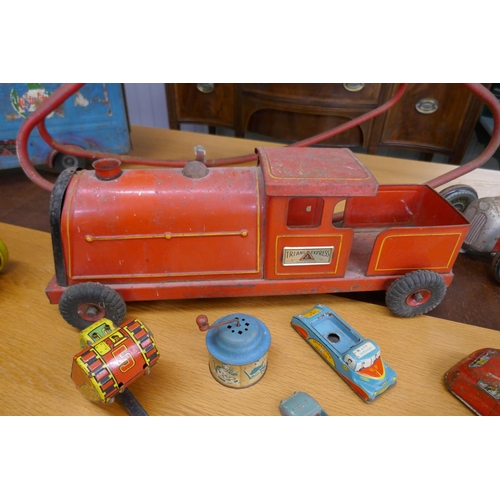 374 - Collection of tin plate toys to include Triang together with a rocking horse