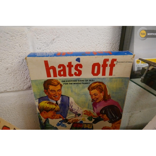 427 - Collection of vintage games to include Battling Tops, Hats Off and Bayko model building set