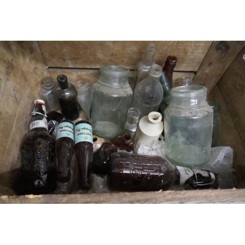 431 - Wooden crate of vintage glass bottles