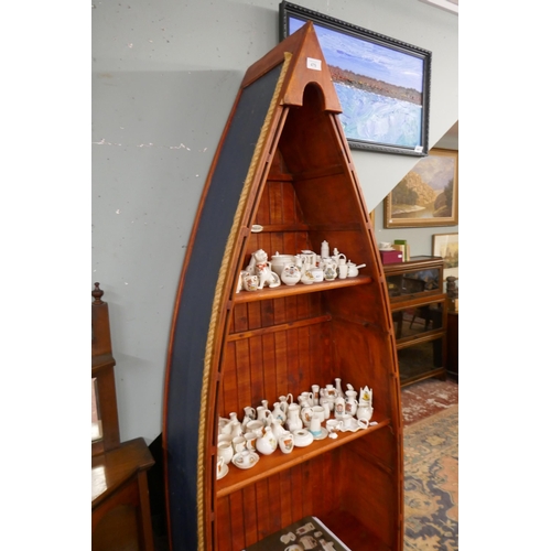 479 - Boat shaped shelf unit - Approx size: W: 66cm D: 28cm H: 203cm