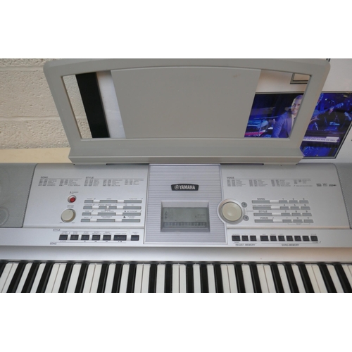 526 - Yamaha Portable Grand keyboard model DGX-205