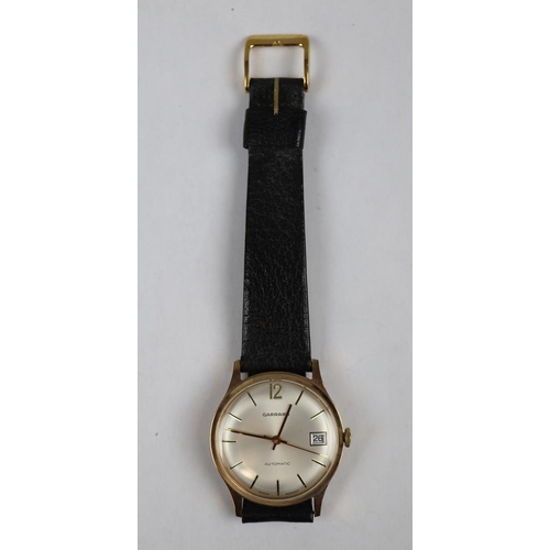 103 - 9ct Gold Garrard watch