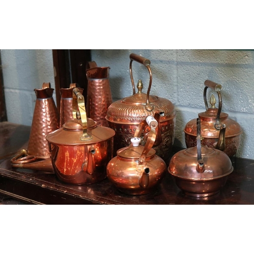 165 - Collection of copper to include kettles and jugs