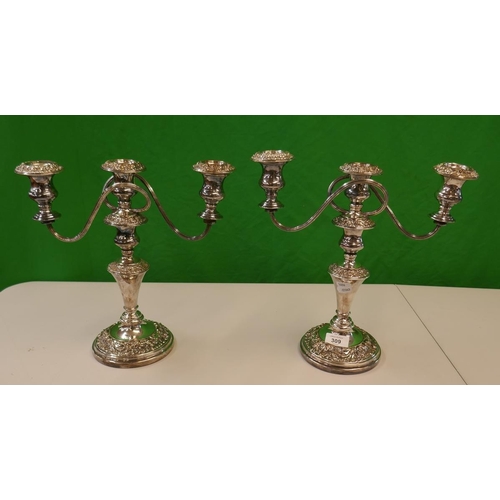 309 - Pair of silver plate candelabra