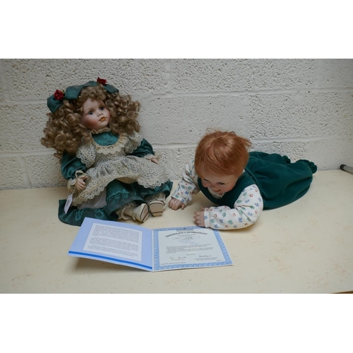 504 - 2 Brandon collectable dolls one with COA