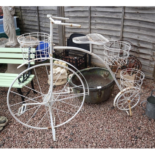 558 - Wrought iron plant stand in the form of a penny farthing