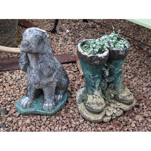 563 - Ornamental stone dog together with stone wellingtons
