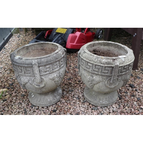 565 - Pair of stone pedestal planters
