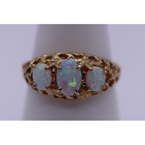 70 - 9ct gold opal set ring - Size R