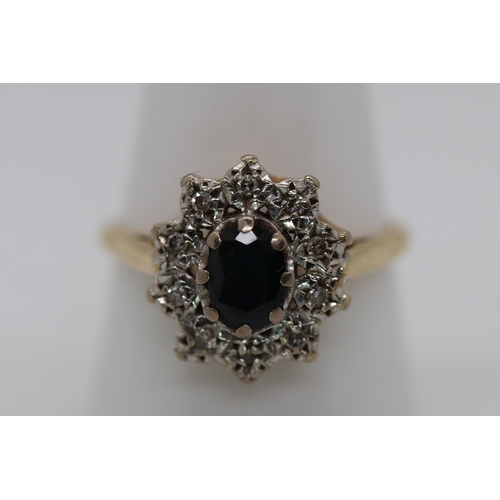 75 - 9ct gold diamond and sapphire set ring - Size R