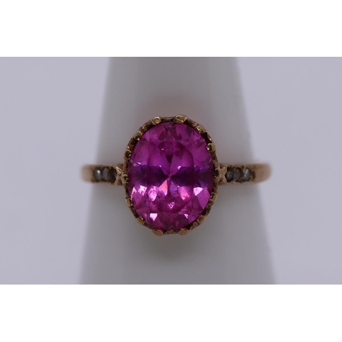 76 - 9ct gold pink topaz set ring - Size M