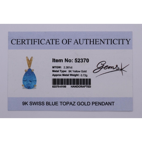 78 - 9ct gold Swiss blue topaz set pendant on 9ct gold chain with COA