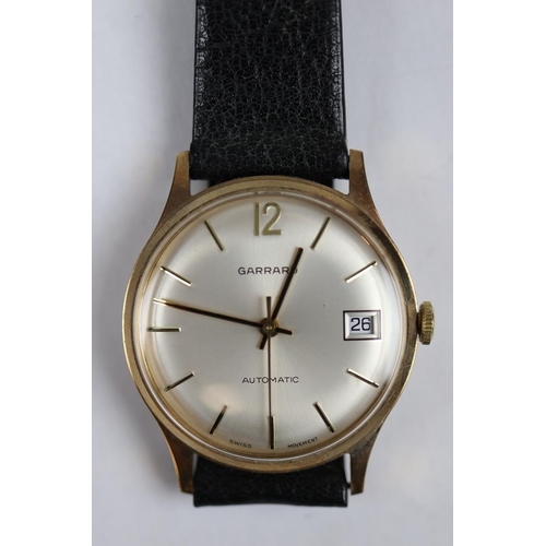 103 - 9ct Gold Garrard watch