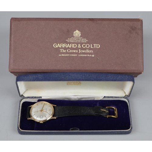 103 - 9ct Gold Garrard watch