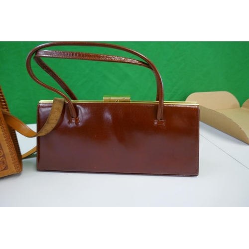 306 - 2 vintage leather handbags