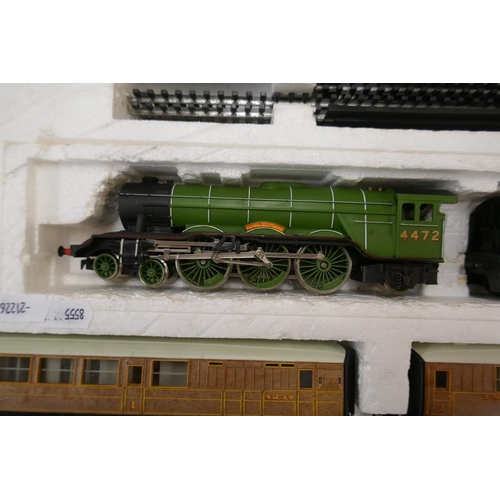 323 - Hornby Flying Scotsman set together with 4 carriages