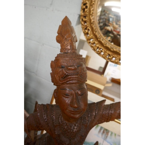 356 - Pair of large Burmese hardwood deity figures - Approx height of tallest 91cm