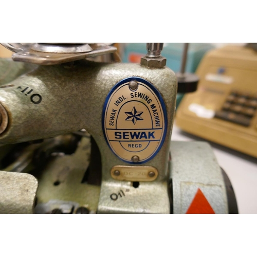 404 - Sewak vintage 4 spool overlocking machine