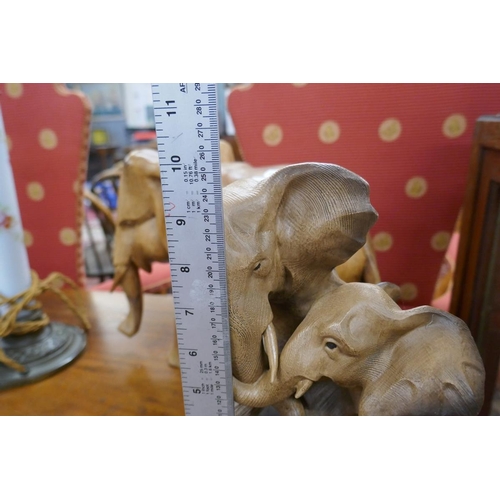 472 - 2 carved elephant figures 