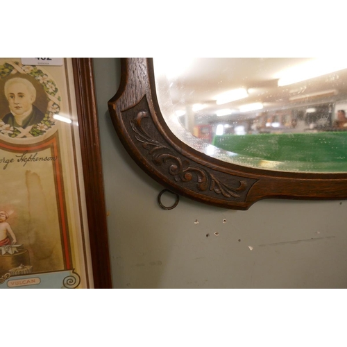 483 - Oak framed bevelled glass mirror