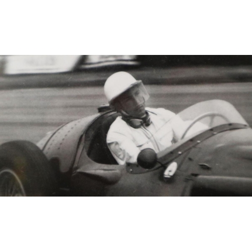 109 - Framed photograph of Stirling Moss at Silverstone Grand Prix 1956 - Approx 55cm x 44cm