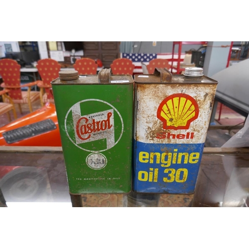 190 - Shell can, Castrol can together with 2 red oil sprayers