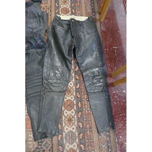 210 - 3 pairs of leather motorcycle trousers