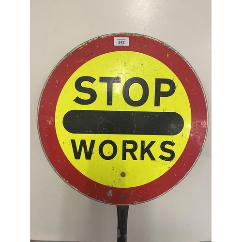 242 - Stop Works lollipop sign