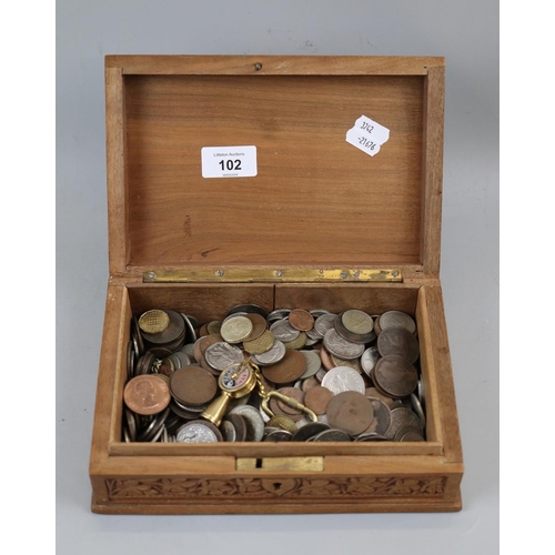 102 - Carved wooden box containing old coins