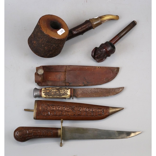 124 - 2 vintage smoking pipes together with 2 hunting knives